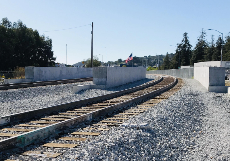 Tracks and ballast near San Rafael Creek for SMART Larkspur Extension.