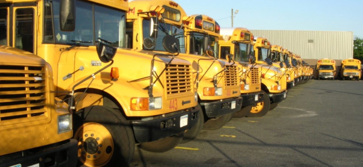 Row of parked school buses