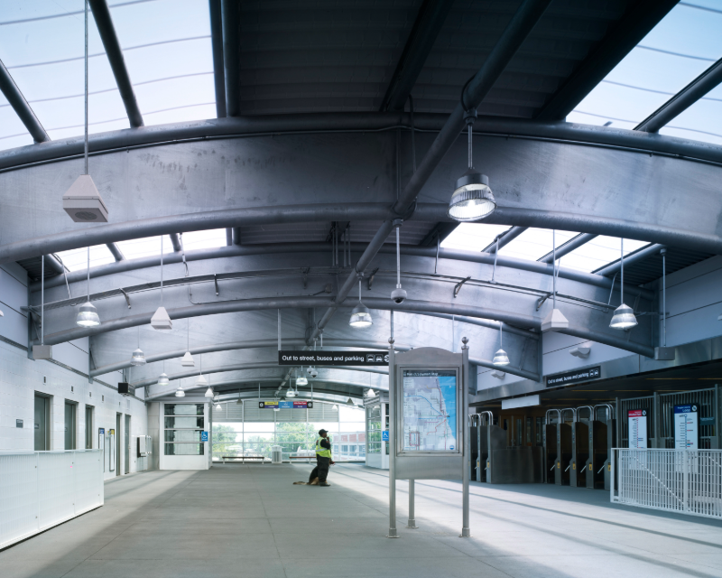 Station area in front of turnstiles at Howard Station in Chicago.