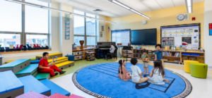 Young students in colorful classroom during circle time