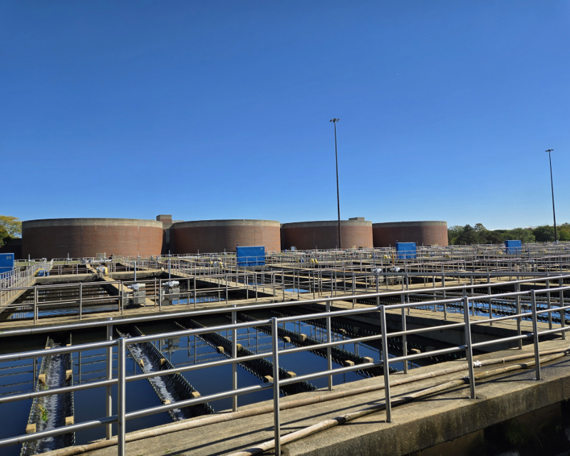PWD's Southwest Water Pollution Control Plant with tanks in background.