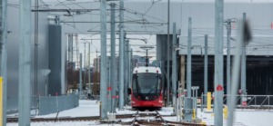Rail car traveling head-on on snowy tracks