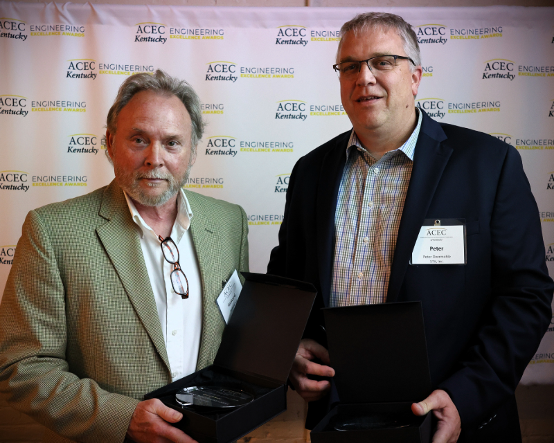 STV's Richard Tutt and Peter Overmohle receive their Grand Award from ACEC Kentucky.