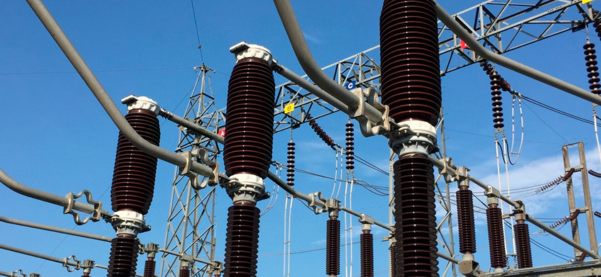 Powerlines against blue sky