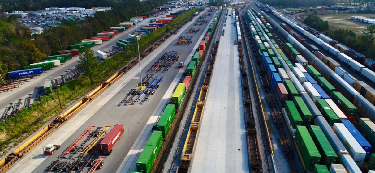Bird's eye view of a frieght rail yard full of rail cars