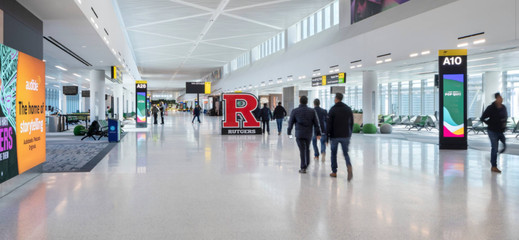 interior of Newark Airport Terminal A, featuring one of the concourses and several gate entrances