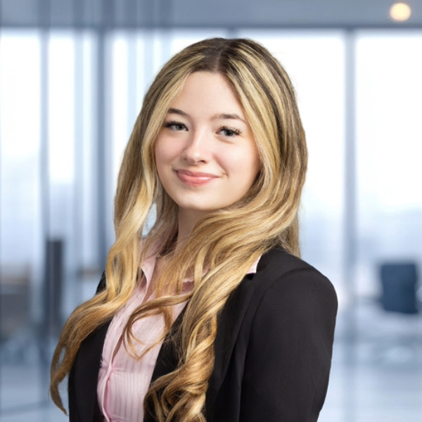Headshot of woman long blond hair in black blazer