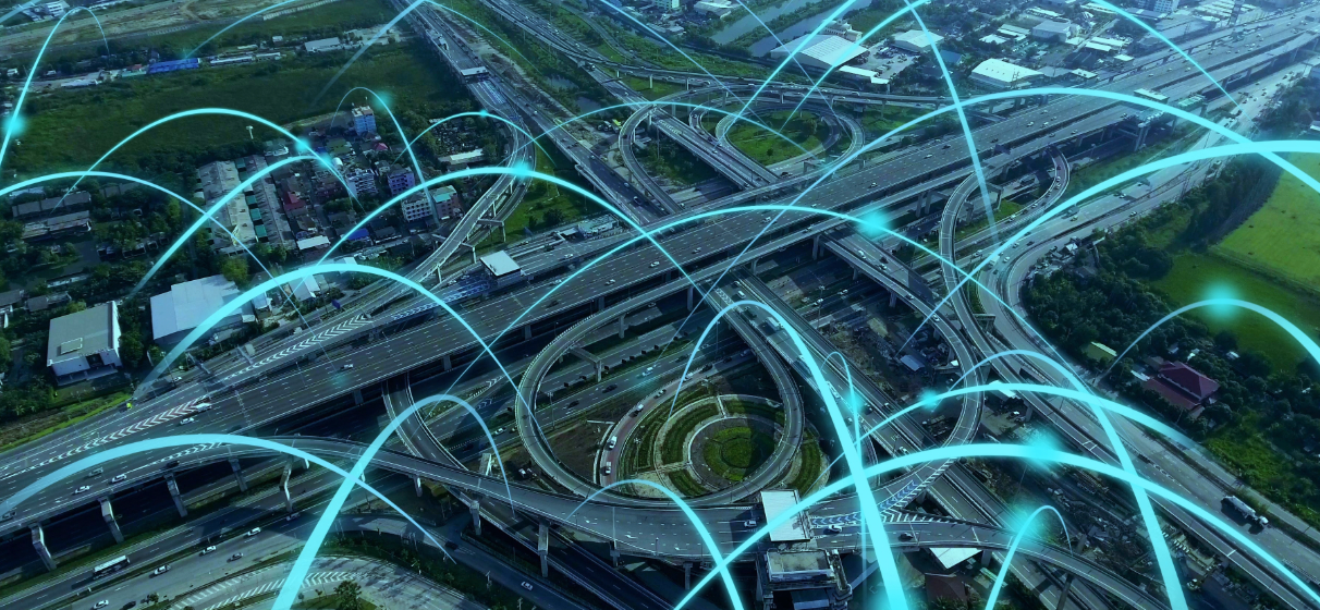 overhead view of highway with blue digital connections between vehicles