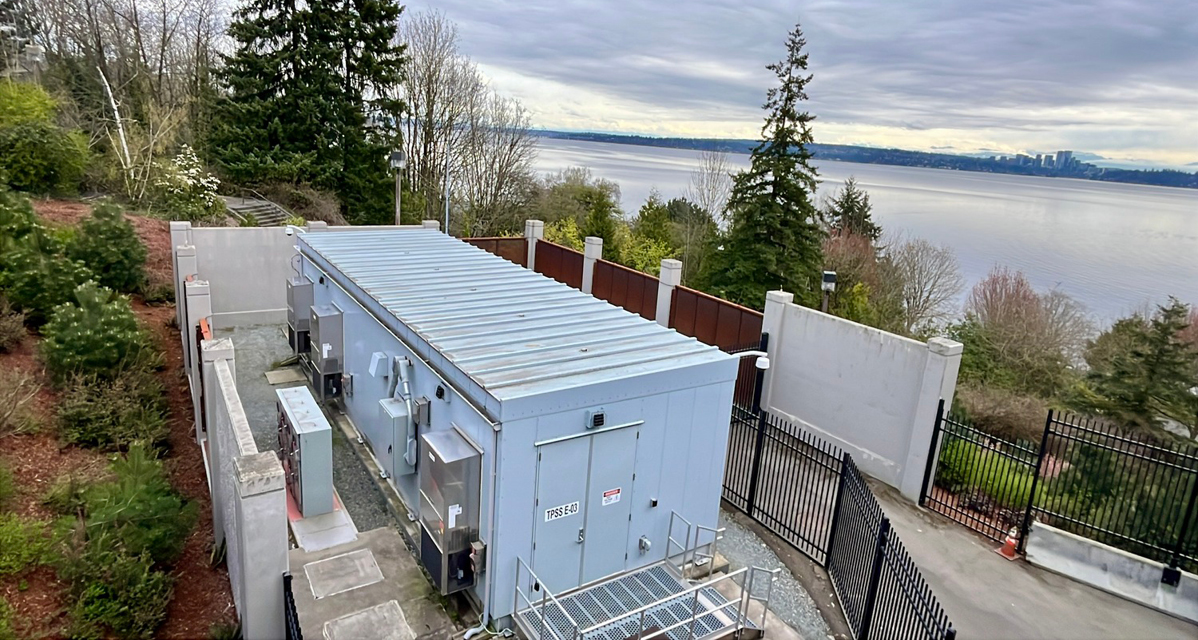 Overhead view of the Sound Transit Crosslake Connection substation overlooking the forest and waterfront