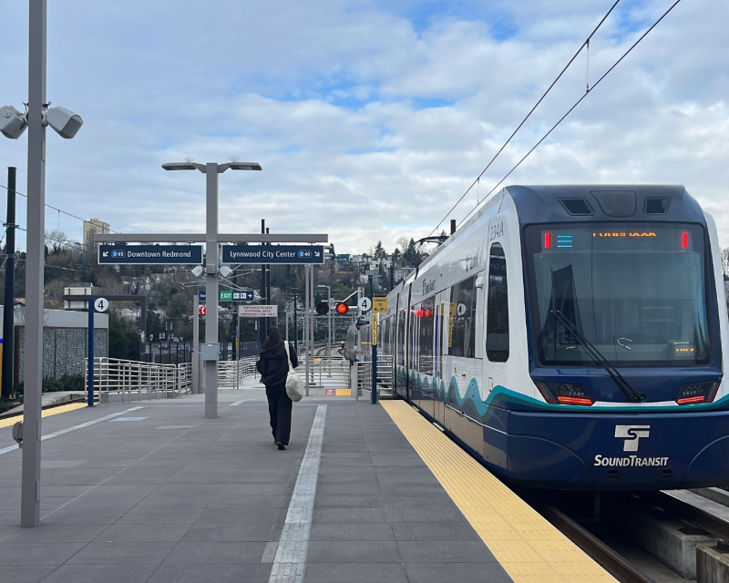 A Sound Transit light rail vehicle arrives at Crosslake Connection station in Seattle.