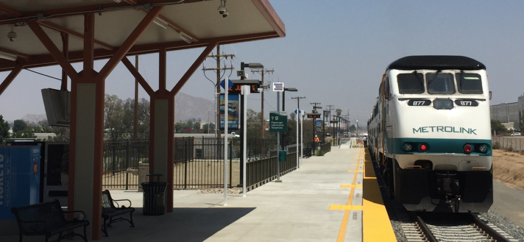 Perris Valley Line station with a train