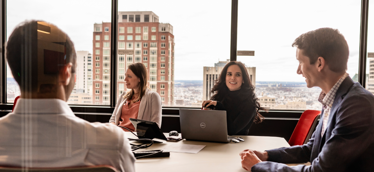 STV team members meeting in the conference room in the Philadelphia office