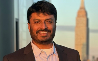 Headshot of Vijo Cherian in grid format