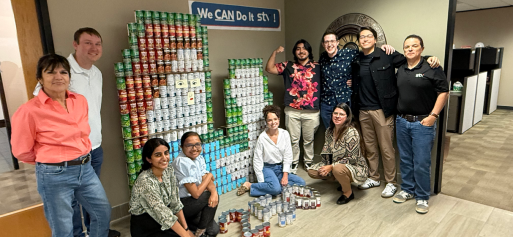 Members of STV's Austin team participating in the Canstruction challenge
