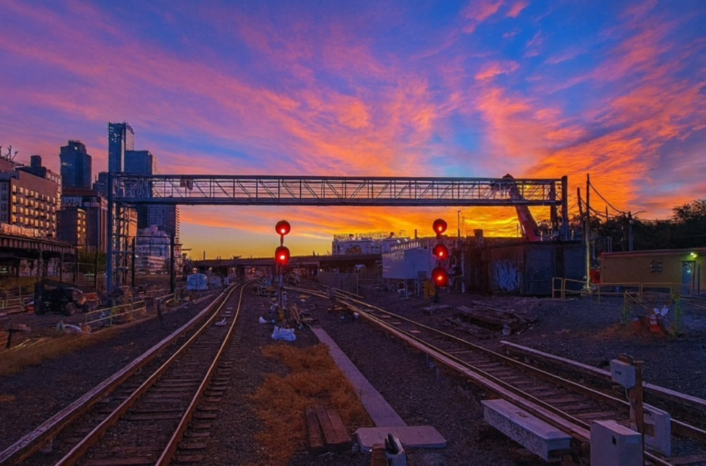Utility bridge crossing rail tracks outside the East River Tunnel entrance point in New York.