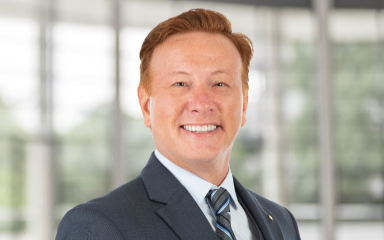 Headshot of Todd Childress in grid format
