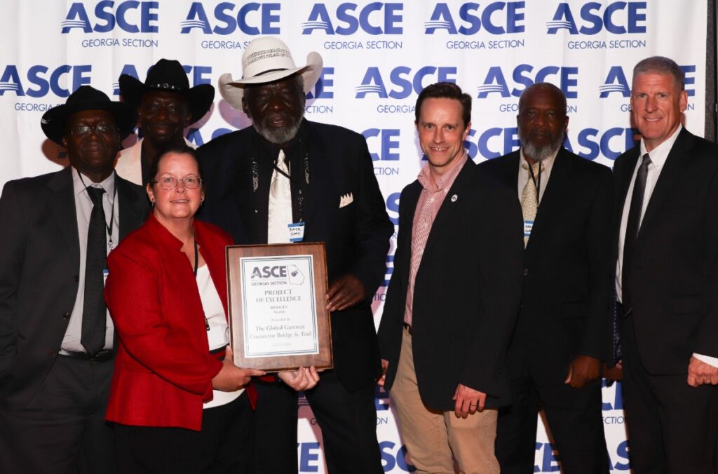 STV team members and clients pose with award plaque at ASCE Georgia project excellence awards.