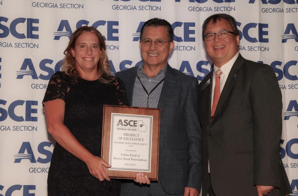 STV team members pose with their plaque at the ASCE Georgia project excellence awards.