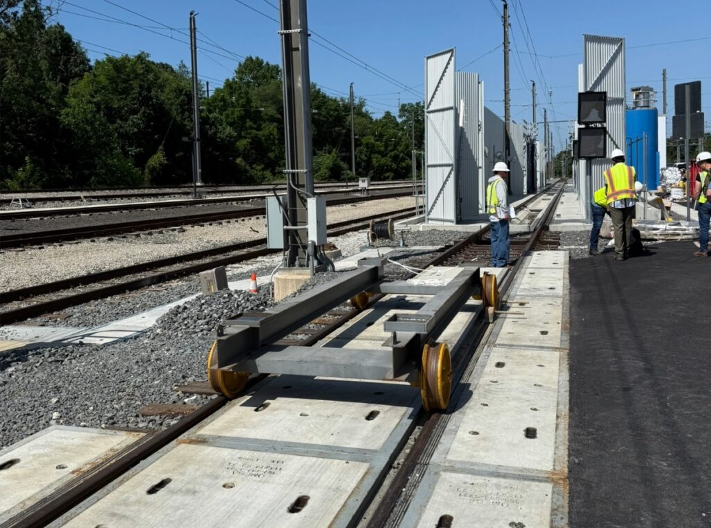Construction crew work on the car washing facility at the SEPTA Frazer Maintenance Facility.
