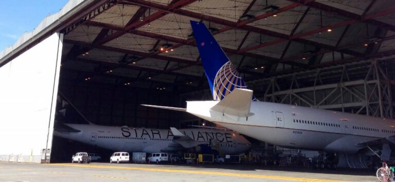 View of two airplanes inside the Superbay Hangar facility at San Francisco International Airport (SFO).