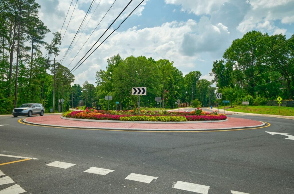 Ground view of vehicle circling Overhead roundabout at Union and Butner roads in South Fulton, GA.