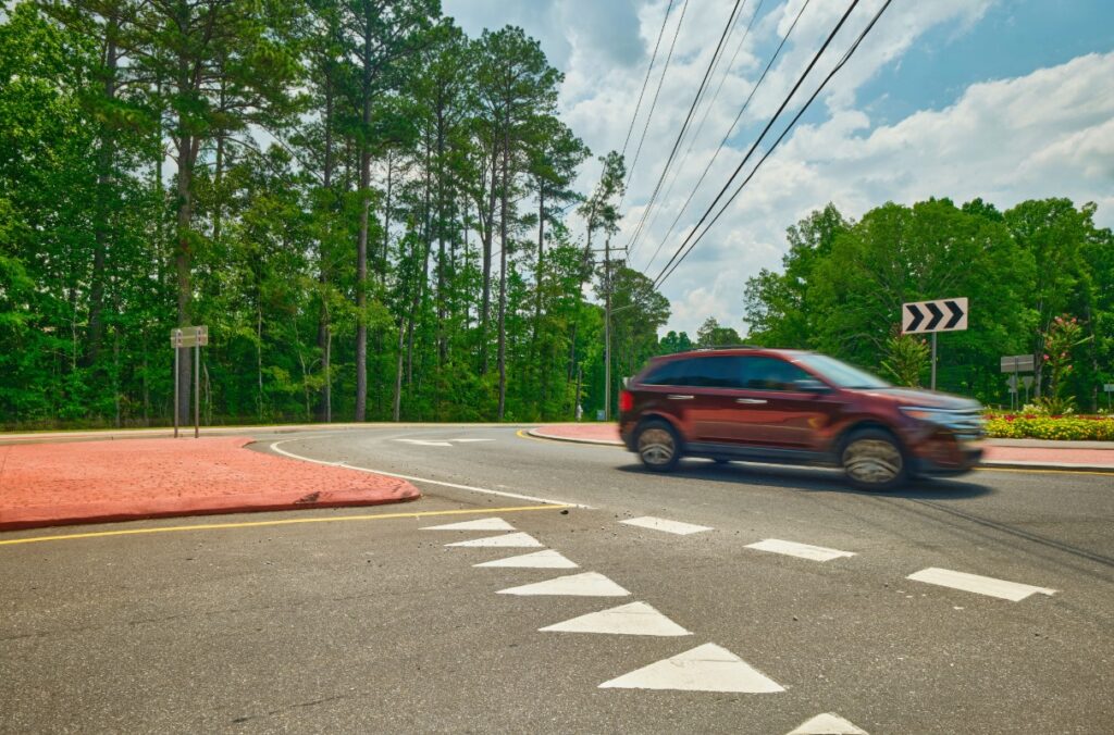 Ground view of vehicle circling Overhead roundabout at Union and Butner roads in South Fulton, GA.