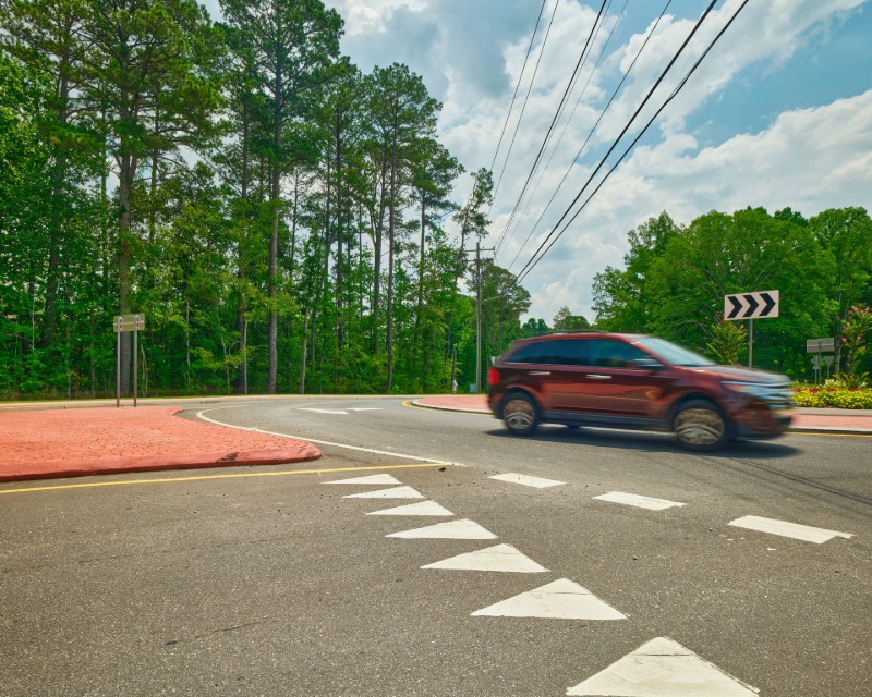 Ground view of vehicle circling Overhead roundabout at Union and Butner roads in South Fulton, GA.