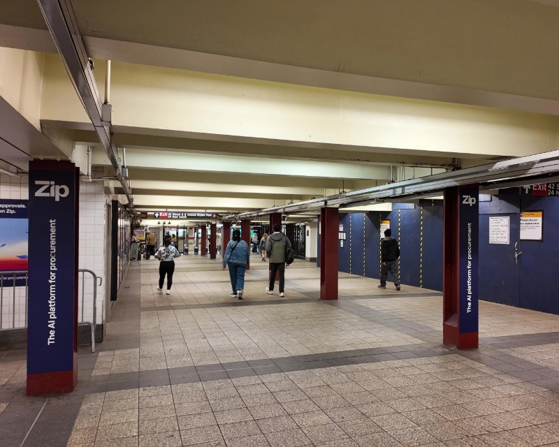 Passengers pass through mezzanine of 42 St-Bryant Park Station in New York.