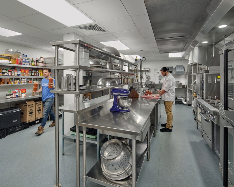 Interior view of volunteers of back kitchen area for Downtown Evening Soup Kitchen (DESK) in New Haven, CT.