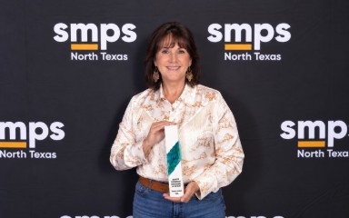 Frances Jensen receiving the "Business Developer of the Year" award from SMPS North Texas in grid format