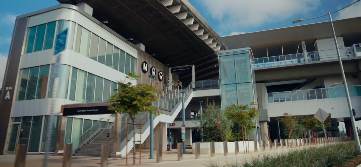 Exterior view of LAX-Metro Center Station showing stairwell to platform level and skywalk to mezzanine level.