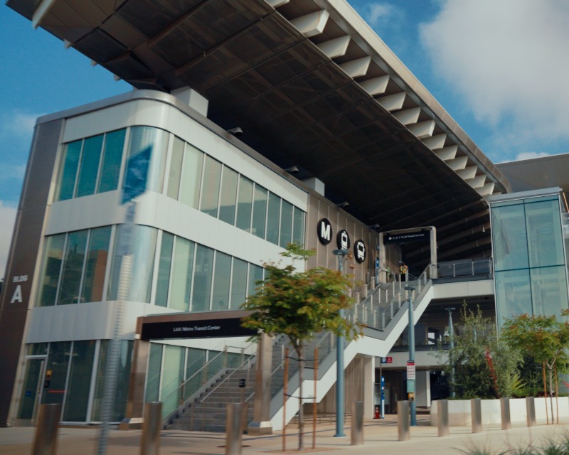 Exterior view of LAX-Metro Center Station showing stairwell to platform level and skywalk to mezzanine level.
